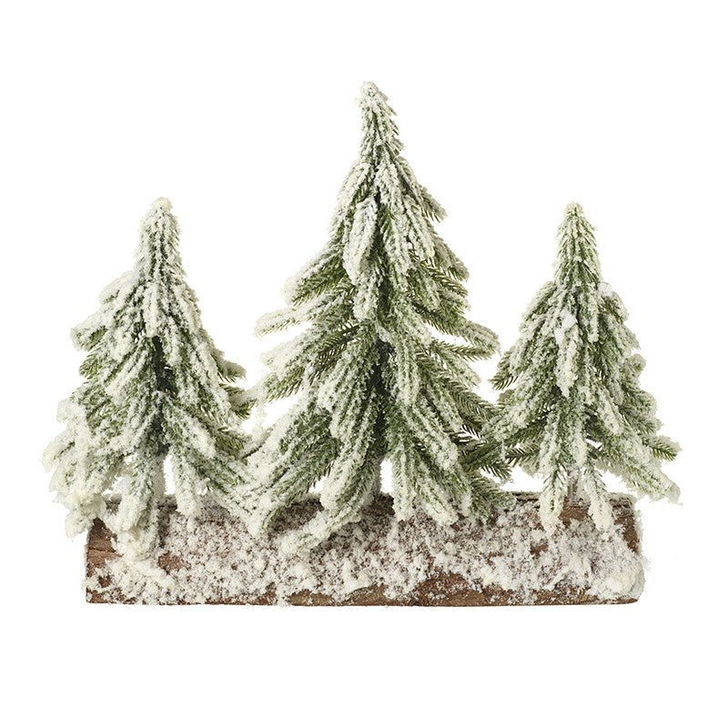 Set of three snowy trees on log