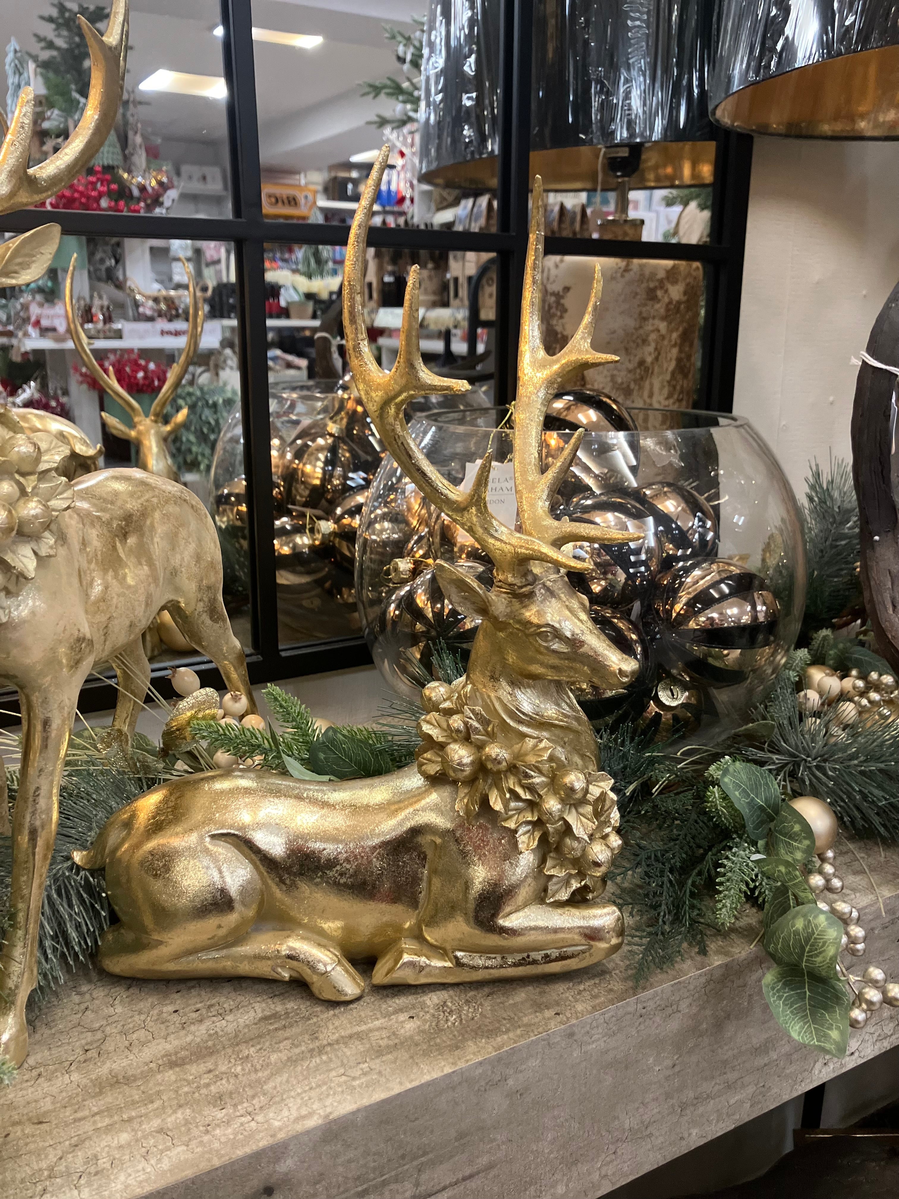 Gold Laying Down Reindeer